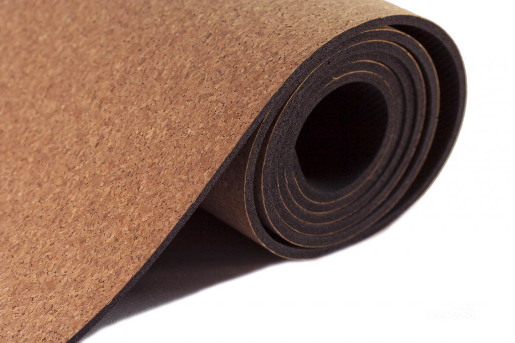 Thick professional cork yoga mat that sticks and provides ultimate grip